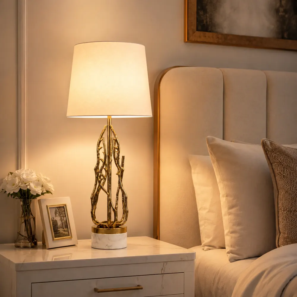 Twig table lamp beside a bed
